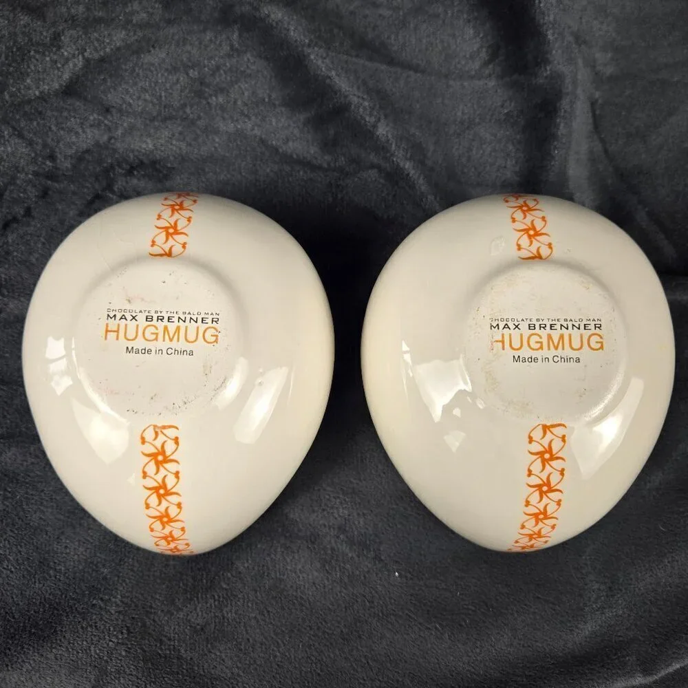 Pair of Chocolate by the Bald Man Max Brenner Hug Mugs White Ceramic
